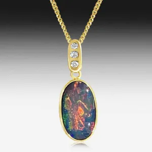 14kt Yellow Gold Pendant set with one Black Opal