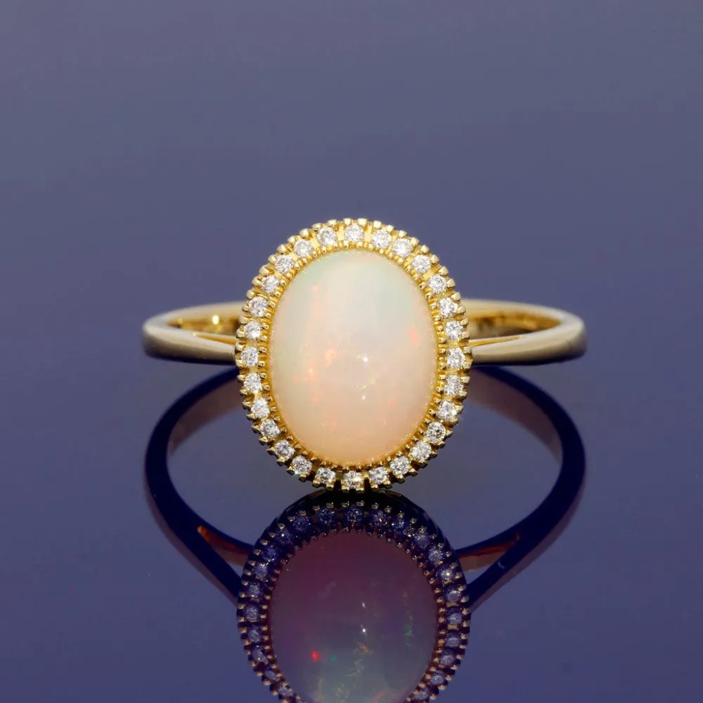 18ct Yellow Gold Oval Opal and Diamond Halo Cluster Ring