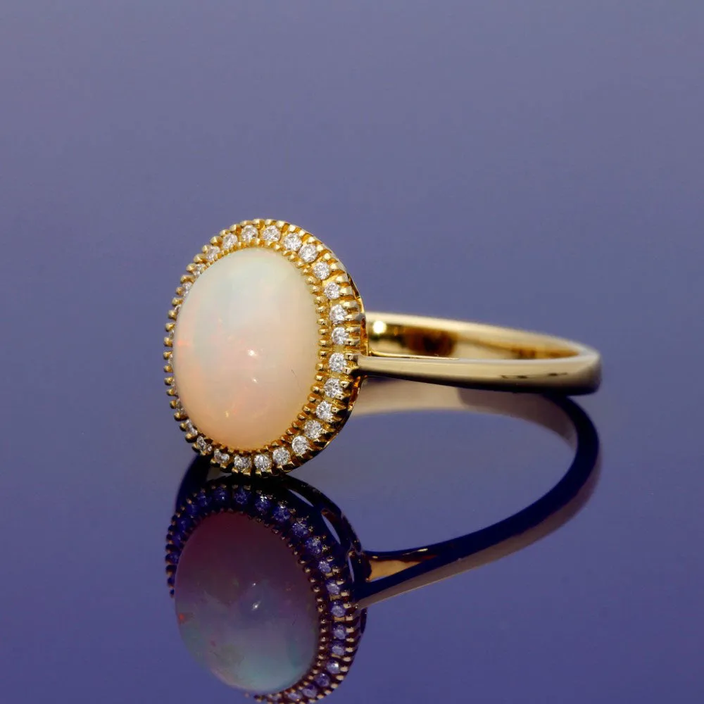 18ct Yellow Gold Oval Opal and Diamond Halo Cluster Ring