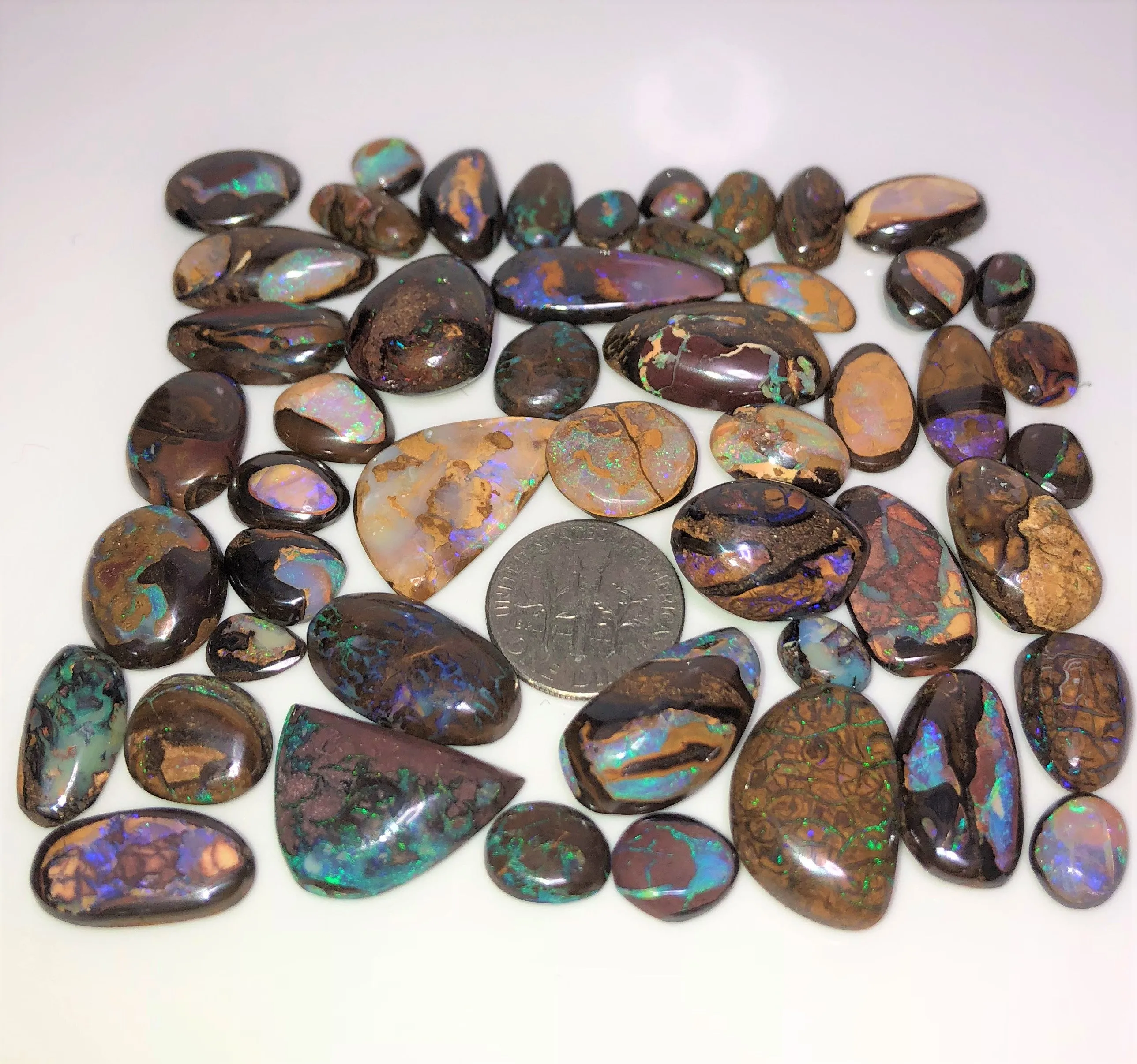 49 Pieces of Koroit matrix opal and crystal centres