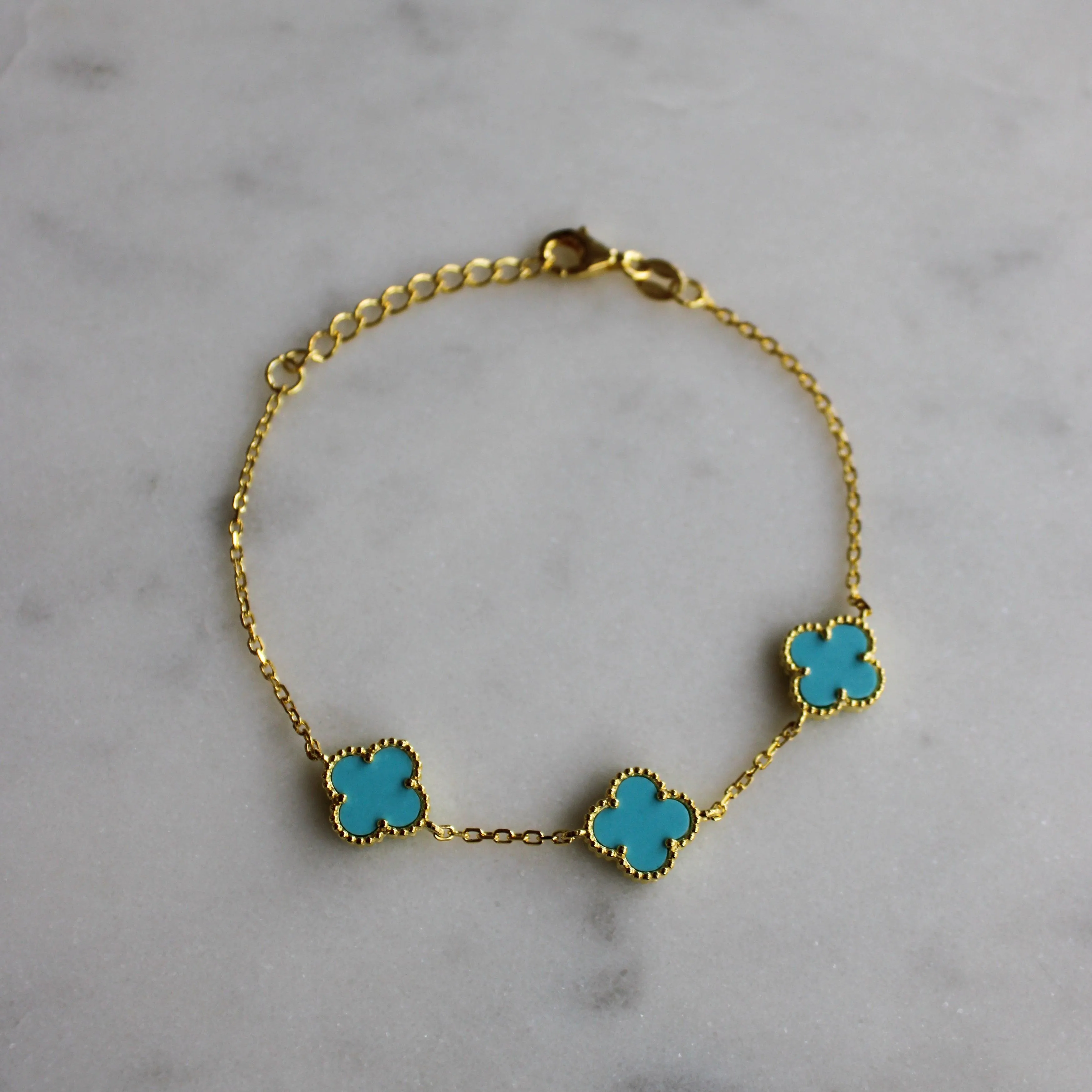 Gold Bracelet with Multi Turquoise Clover Shape