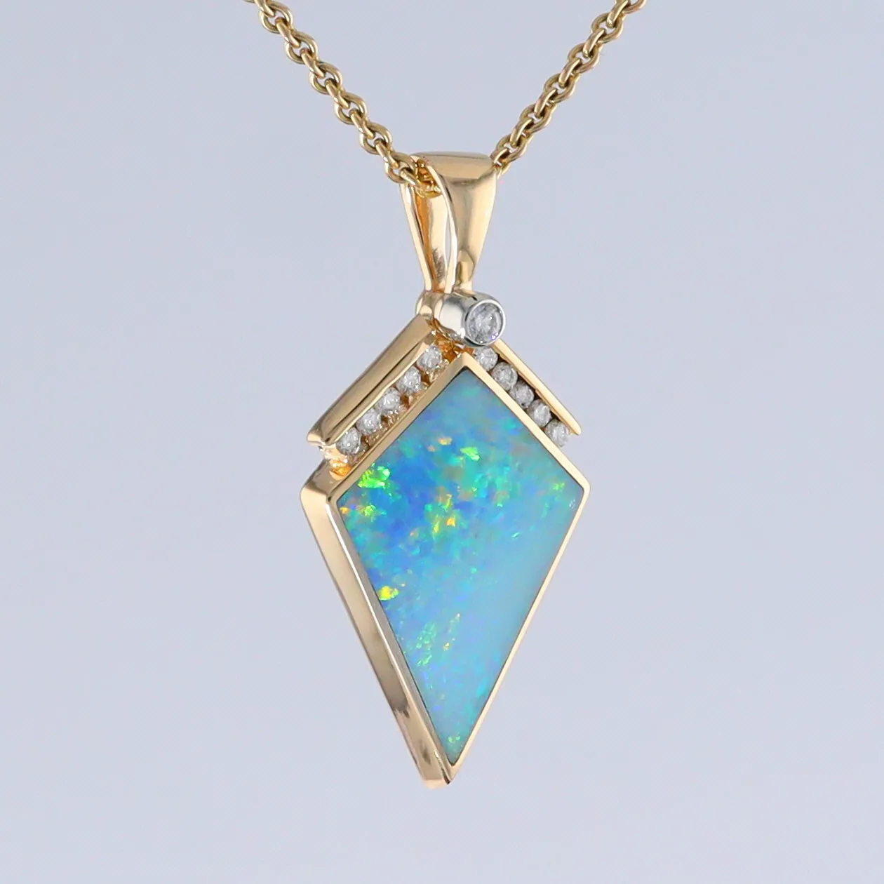 Opal Pendant Inlaid Kite Design with .19ctw Round Diamonds