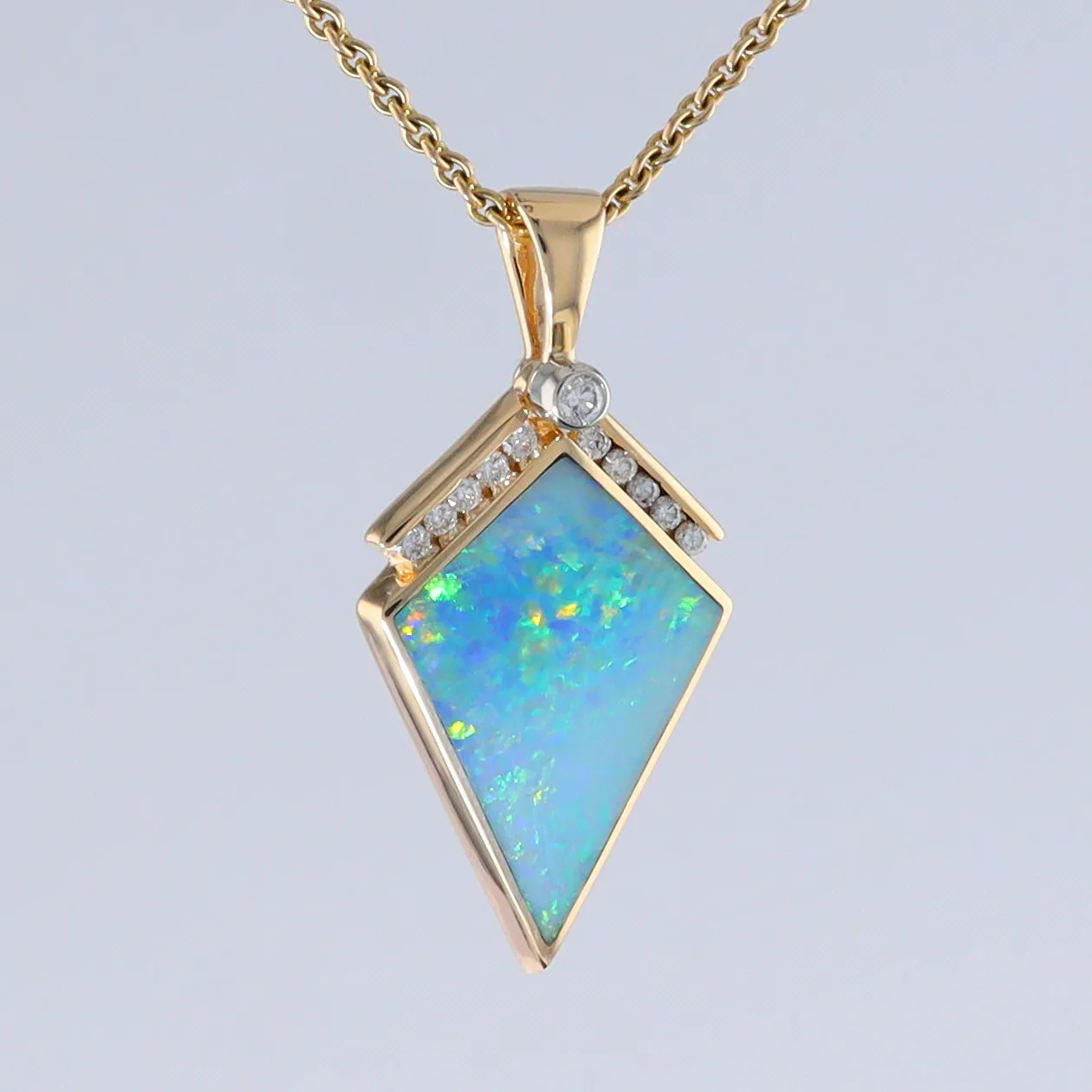 Opal Pendant Inlaid Kite Design with .19ctw Round Diamonds