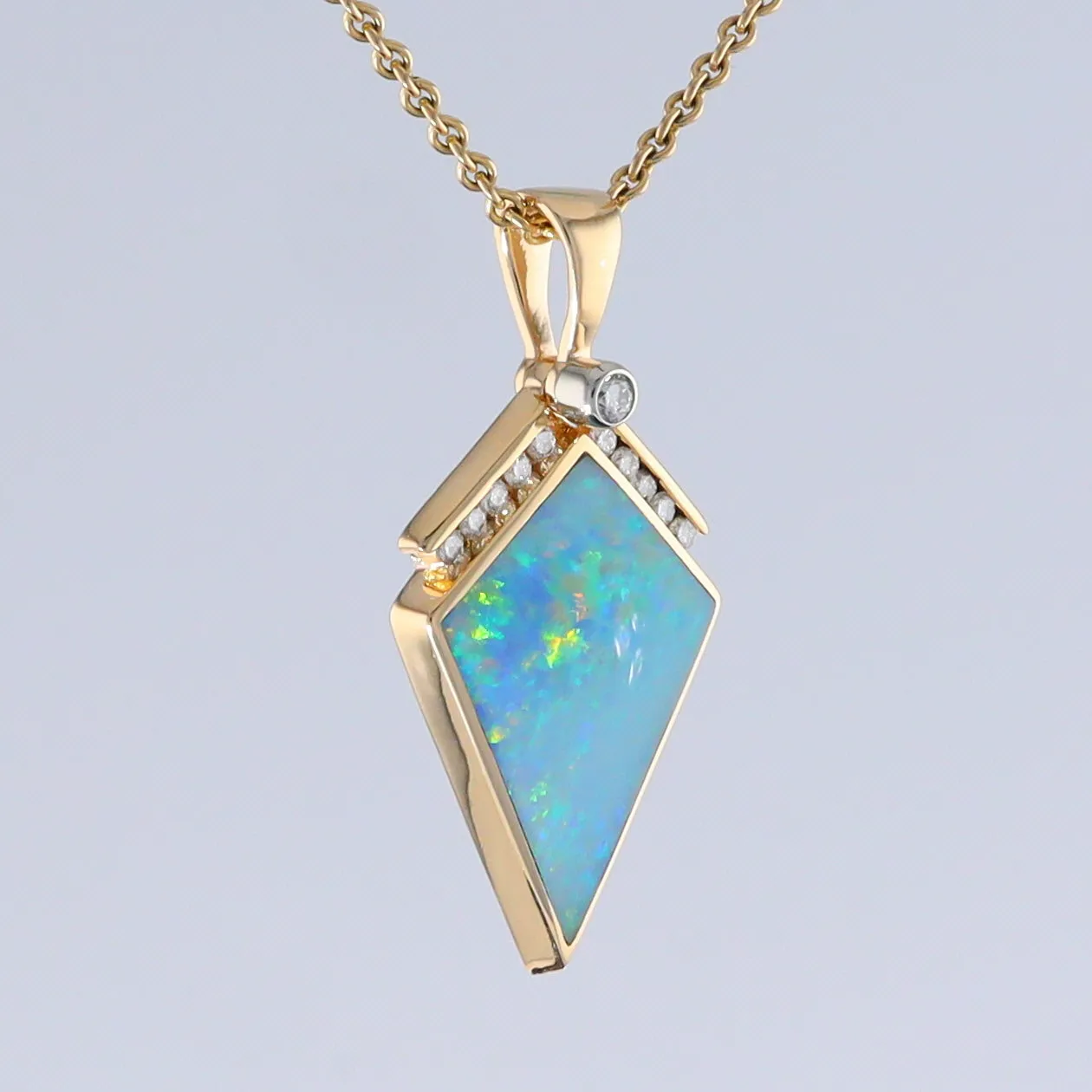 Opal Pendant Inlaid Kite Design with .19ctw Round Diamonds