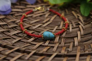 Turquoise and red bracelet